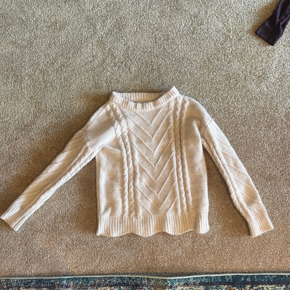 white maurice's sweater